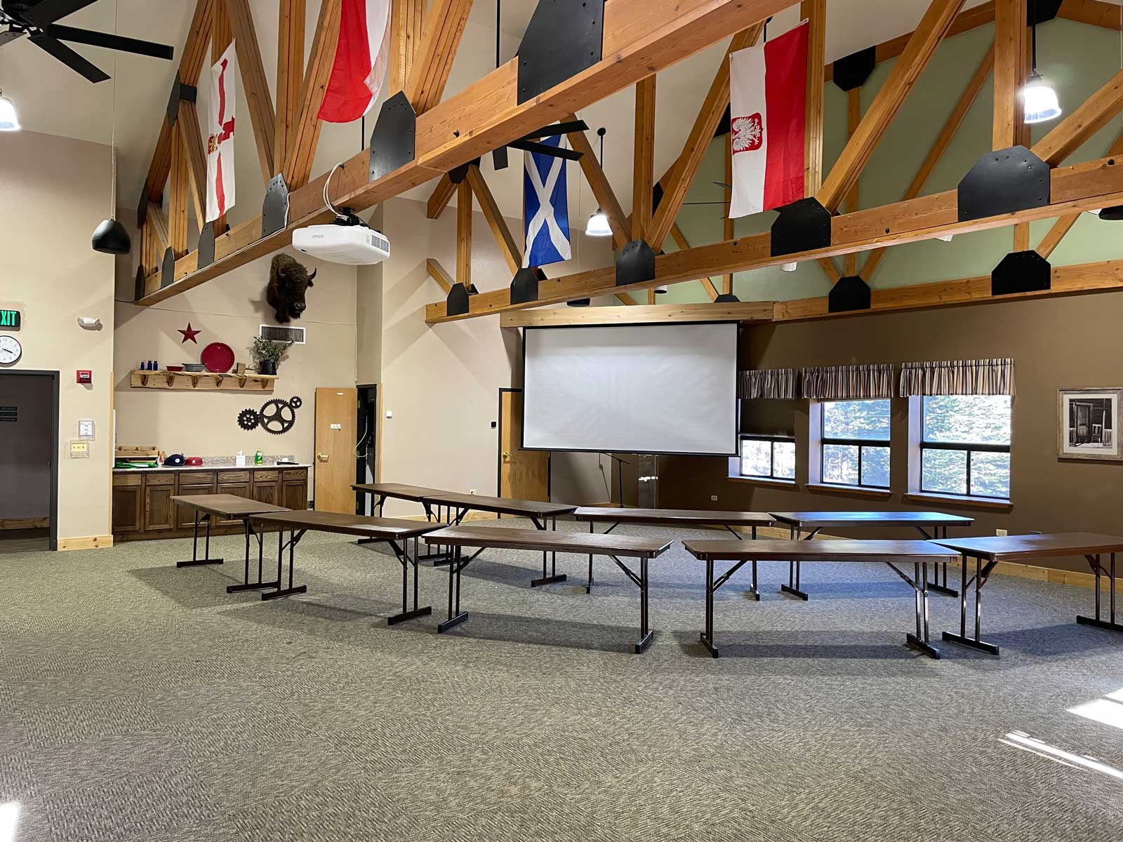 Large dining hall meeting room with tables at The Salvation Army High Peak Camp Colorado