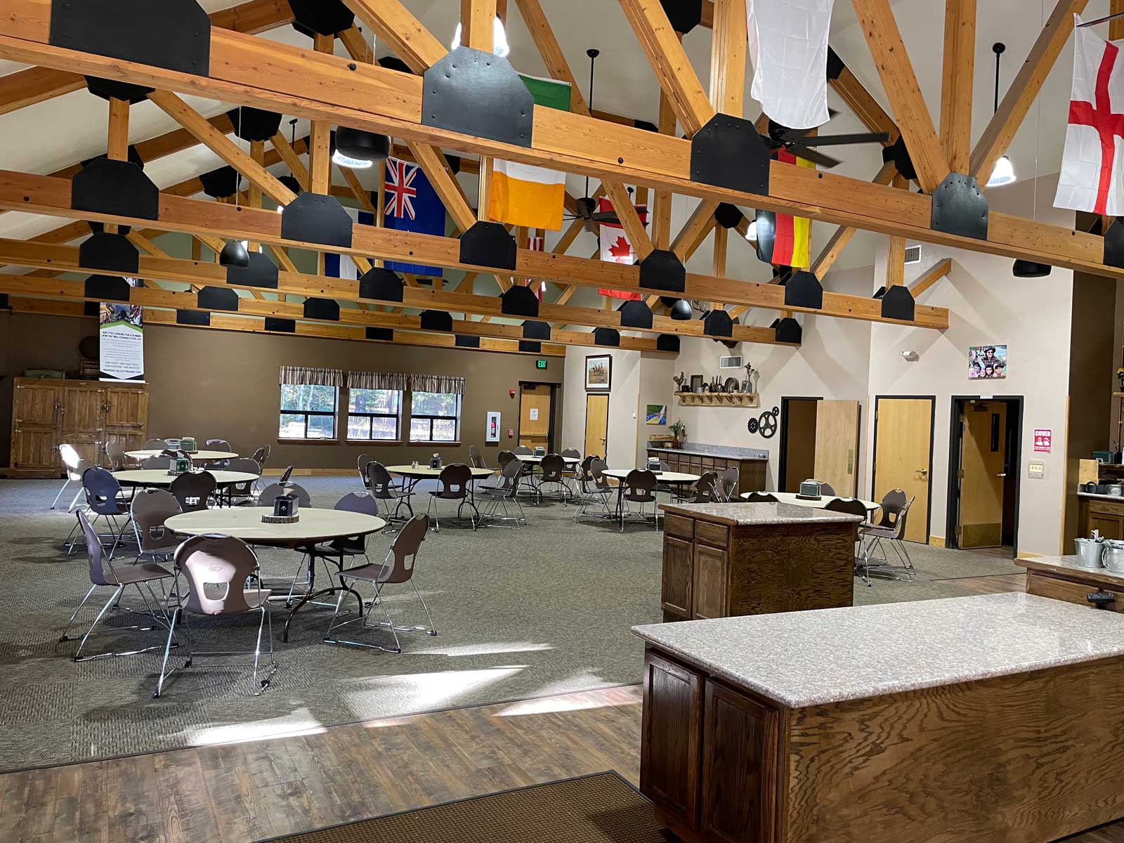 Large dining hall with table and chairs at The Salvation Army High Peak Camp Colorado