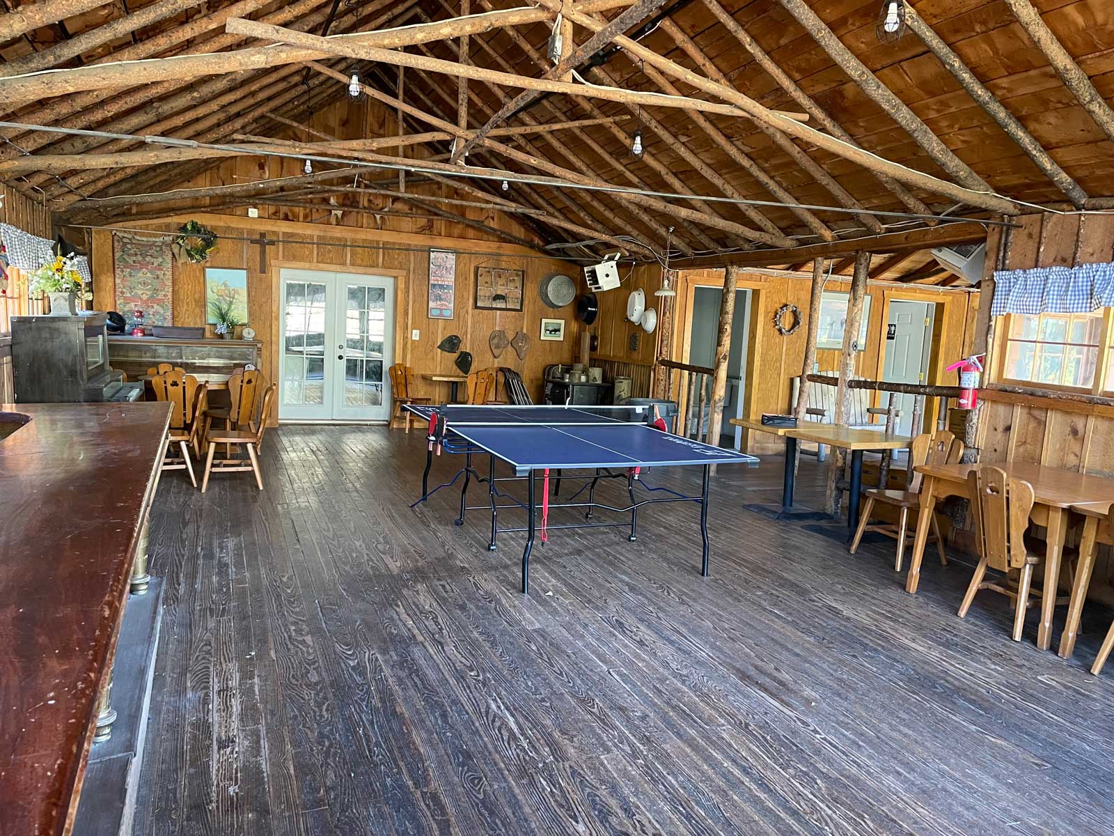 Large room with tables and table tennis at The Salvation Army High Peak Camp Colorado